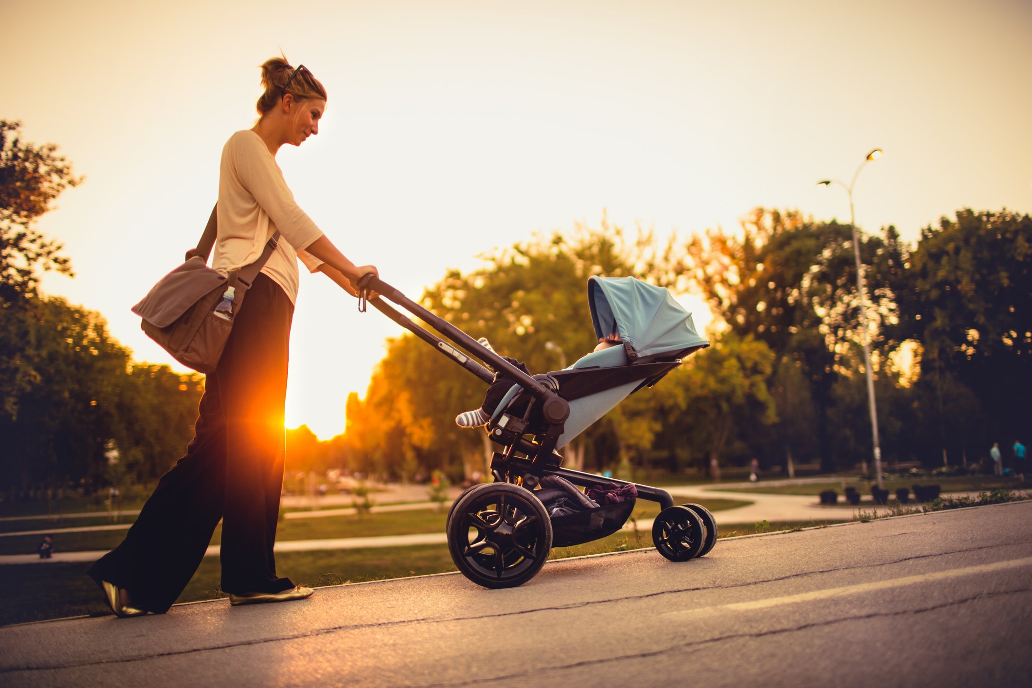 mom pushing stroller