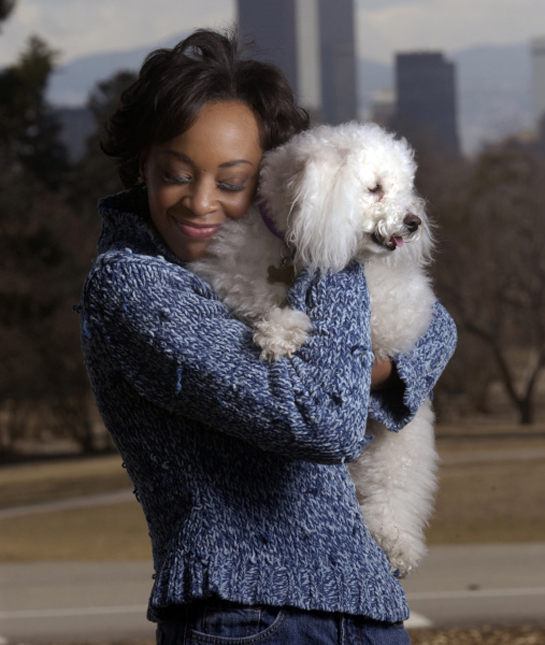 101578-woman-hugging-bichon-frise.jpg