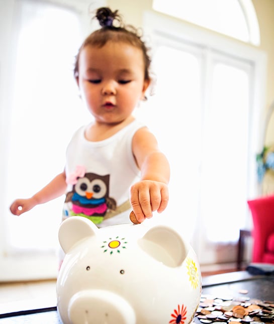 102904-mom_best-toys-motor-skills_06_piggybank_getty_536987785.jpg