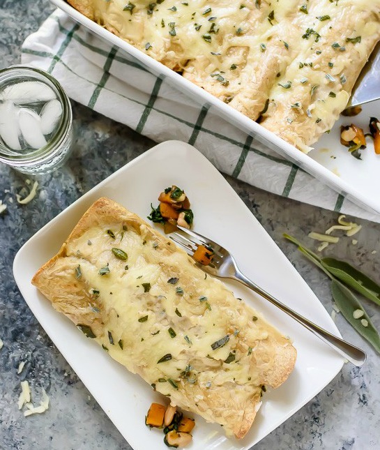 125291-cheesy-butternut-squash-spinach-enchiladas-with-white-bea.jpg
