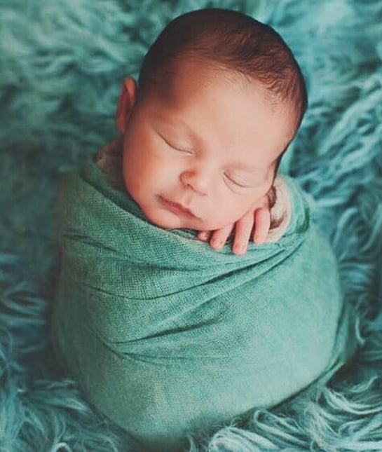 130990-baby-swaddled-blue.jpg