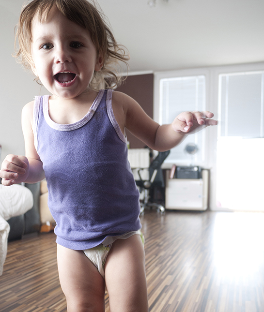 133483-2-girl-in-purple-running-around-house.jpg