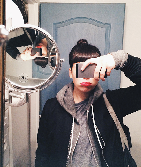 134004-9-girl-looking-at-herself-in-mirror-in-dressing-room.jpg