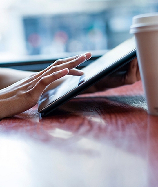 134427-7-closeup-of-womans-hands-on-tablet.jpg