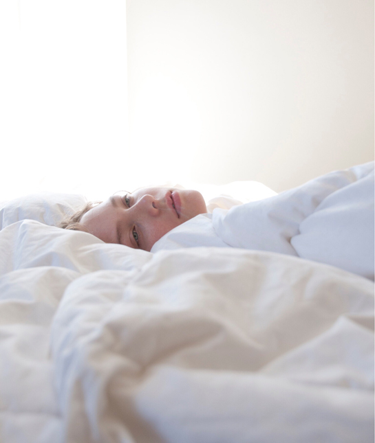 137190-woman-breathing-deeply-in-bed-twenty20.jpg