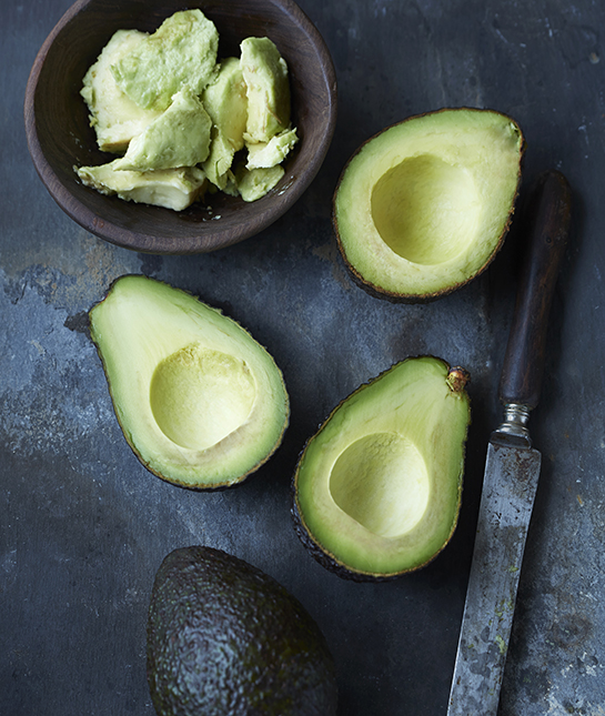 Sliced, mashed and whole avocado
