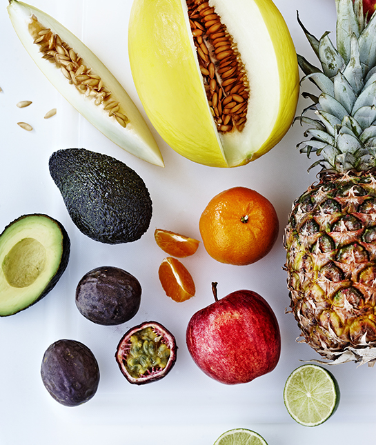 fresh fruit overhead on white chopping board