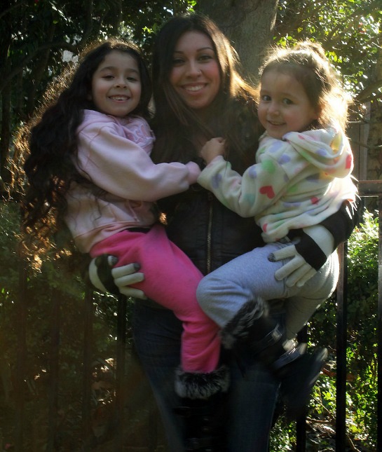 152179-mom-and-2-kids-holding-on-hips-aries.jpg
