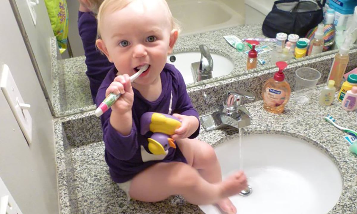 baby-girl-brushing-teeth