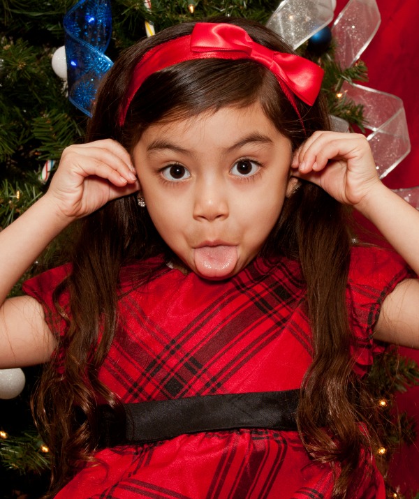 154555-girl-sticking-tongue-out-red-dress-resized.jpg
