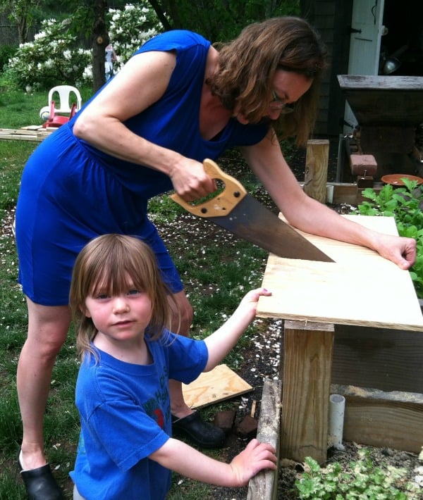 154894-mom-cutting-wood-with-kid-resized.jpg