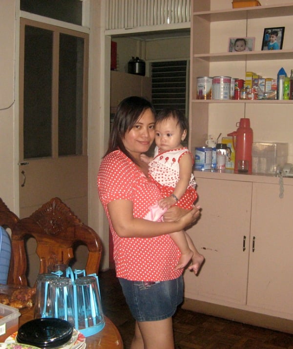 154899-mom-red-polka-dot-shirt-holding-baby-resized.jpg
