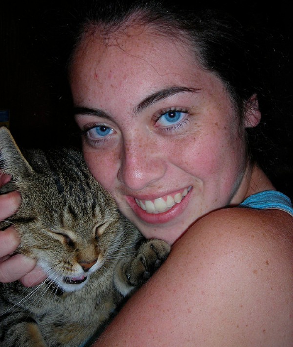 155098-woman-cuddling-cat.jpg