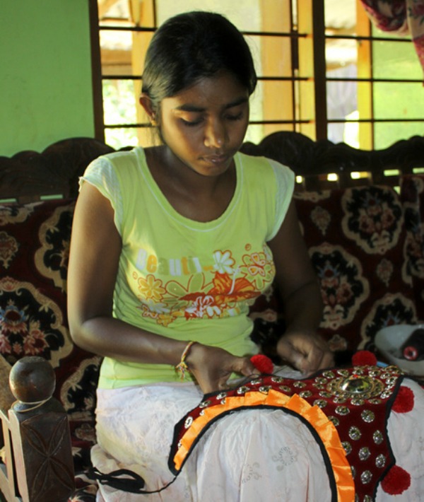 155100-woman-sewing.jpg