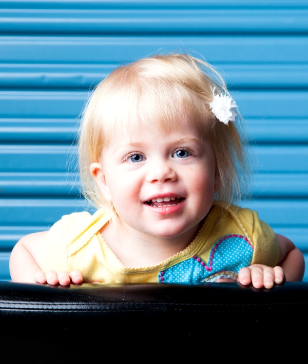 155396-blonde-girl-blue-background-resized.jpg