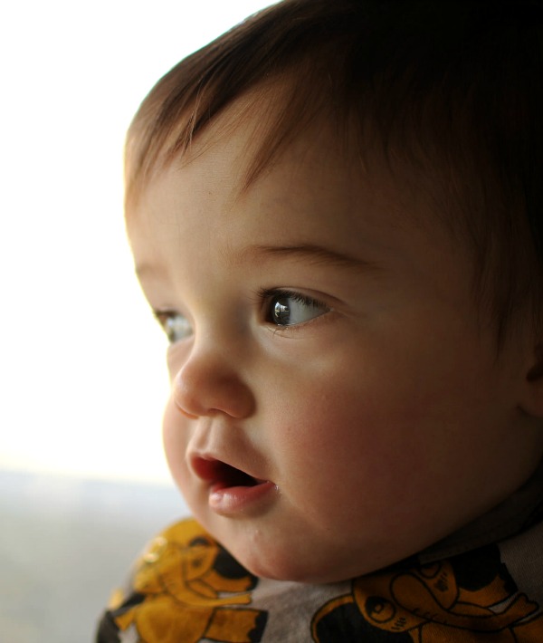 155401-boy-looking-out-window-resized.jpg