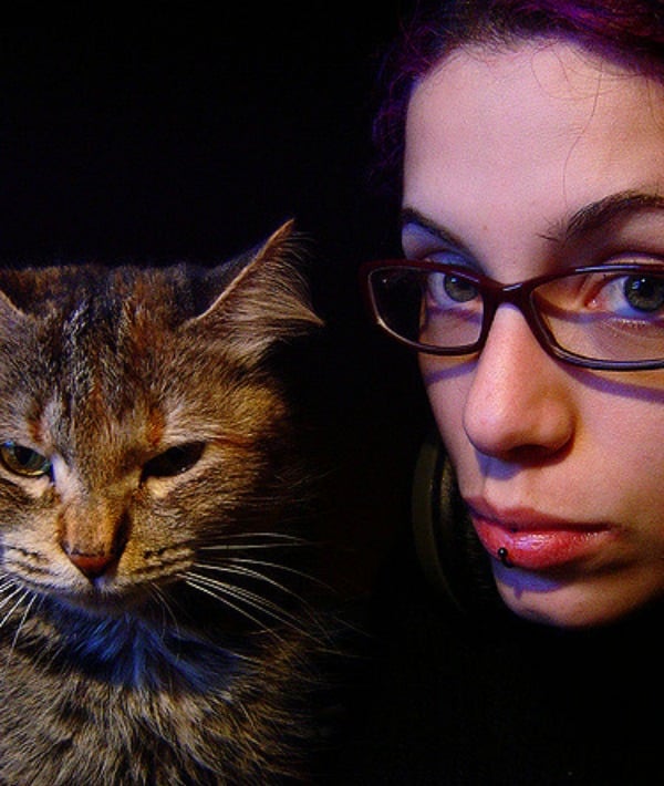 155562-woman-and-her-cat.jpg