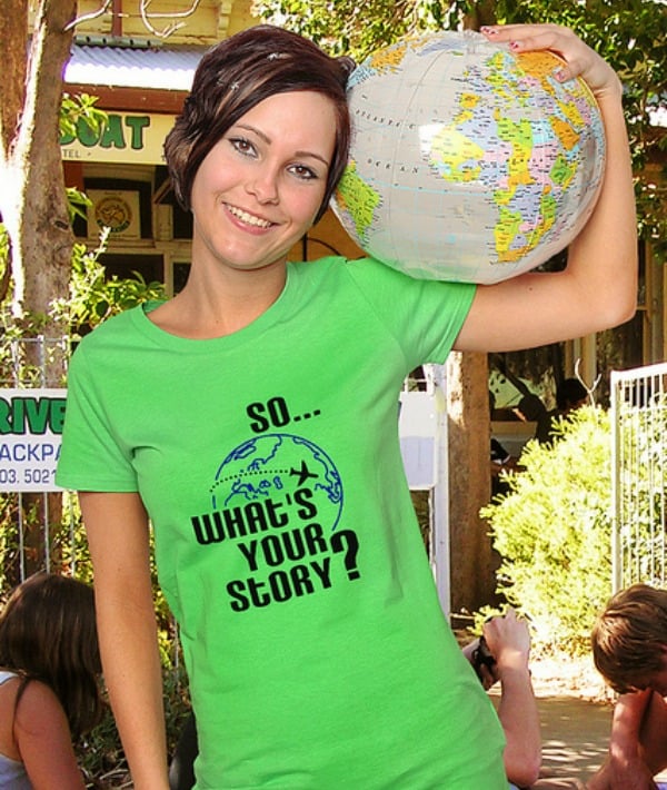155564-woman-holding-inflatable-globe.jpg