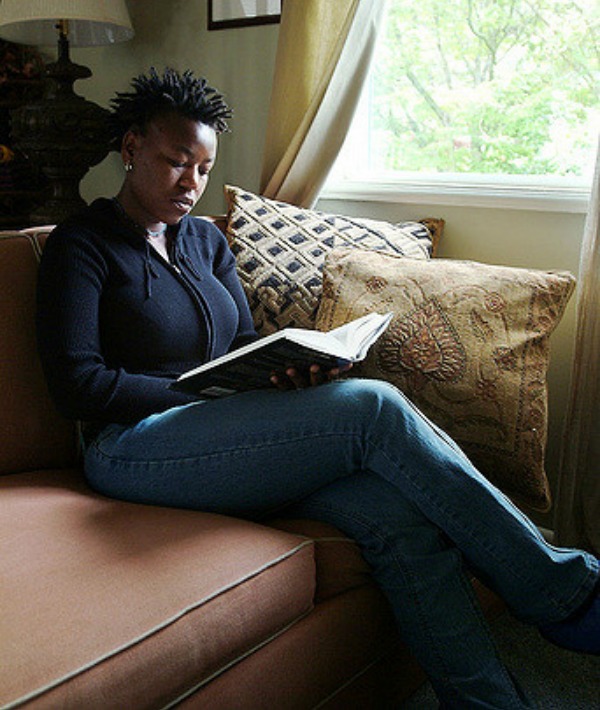 155568-woman-reading-on-couch.jpg