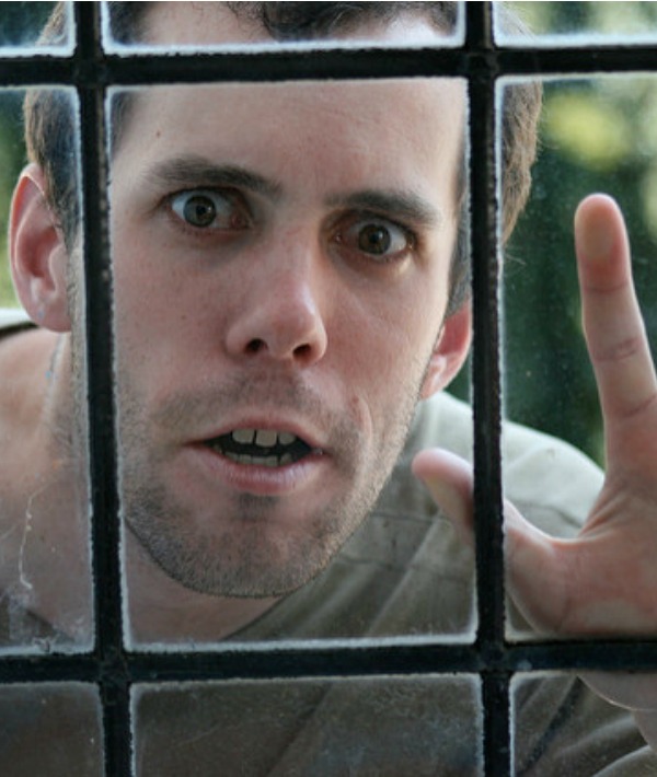 156958-scary-guy-looking-through-window.jpg