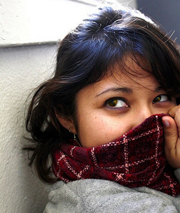 157014-covering-her-face-with-scarf.jpg