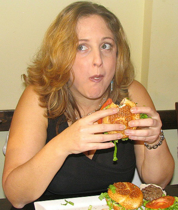 157411-woman-eating-hamburger.jpg