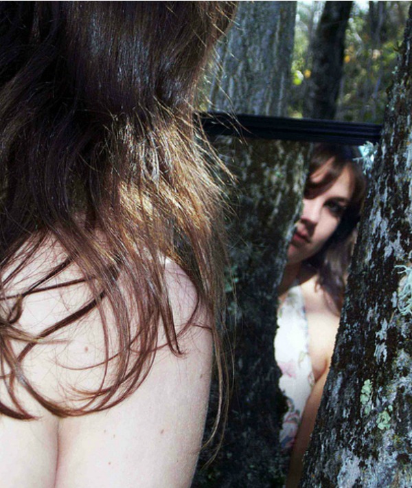 157412-woman-looking-in-mirror.jpg