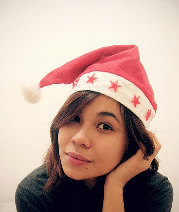 158053-smiling-in-starry-santa-hat.jpg