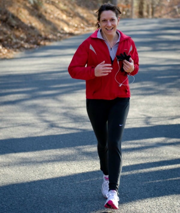 158529-woman-jogging-red-jacket.jpg