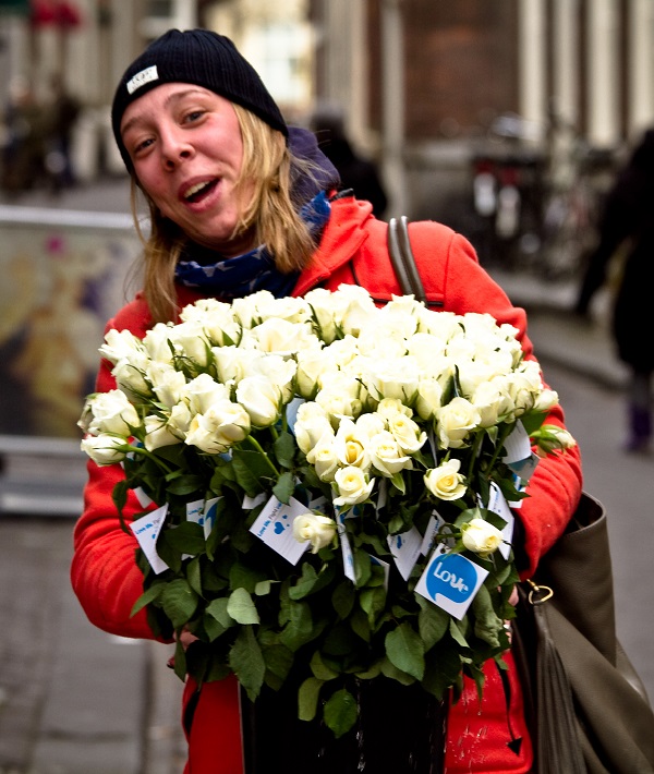 161304-woman-holding-bouquet-flowers.jpg