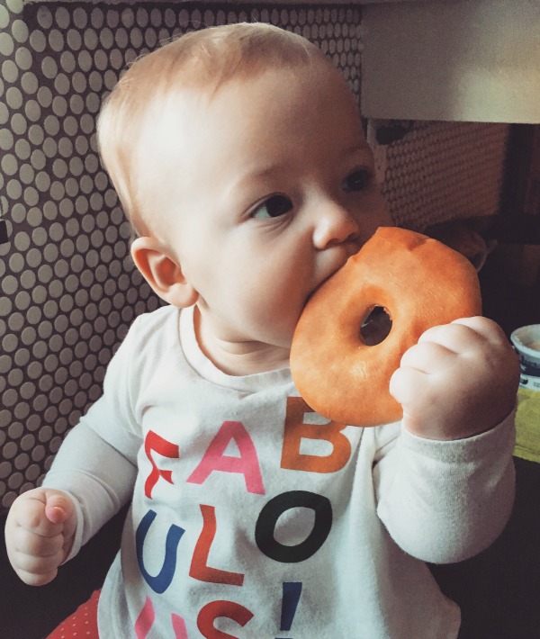 166507-baby-eating-donut-taurus.jpg