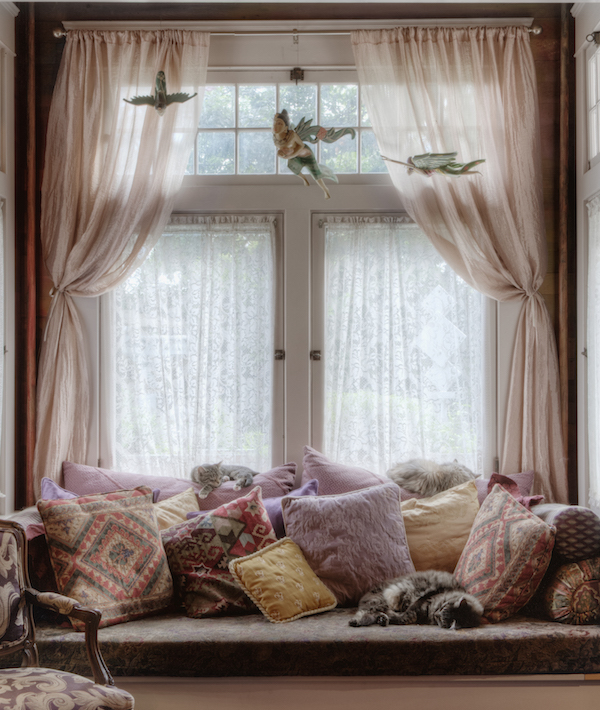 Window seat and curtains in nook