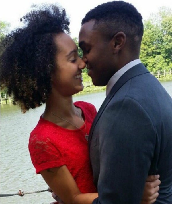 169175-woman-in-a-red-dress-about-to-kiss-a-man-by-a-pond.jpg