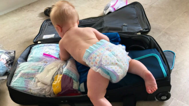 baby-climbing-suitcase