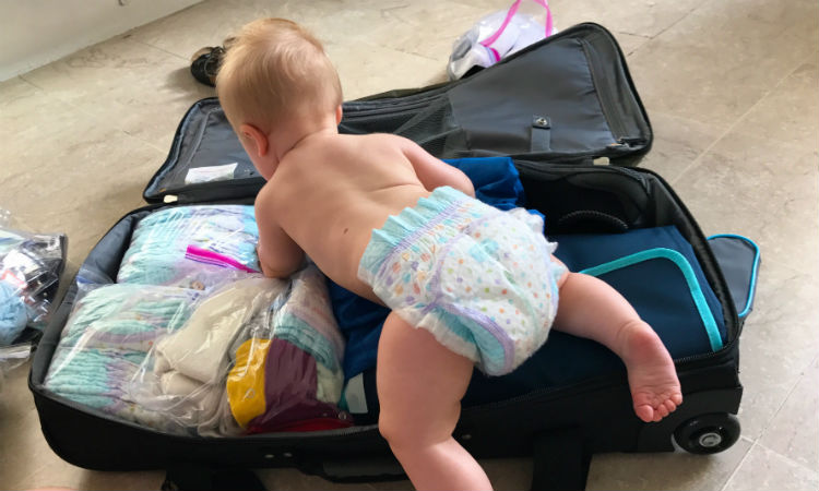 baby-climbing-suitcase