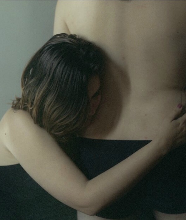 170829-woman-holding-man-1.jpg