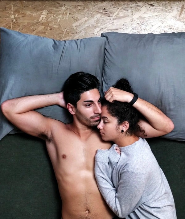 170840-couple-looking-on-in-bed-1.jpg