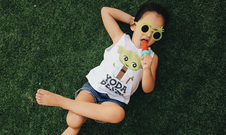 171644-143-146884-girl-lying-grass-summer-popsicle-1467741425.jpg