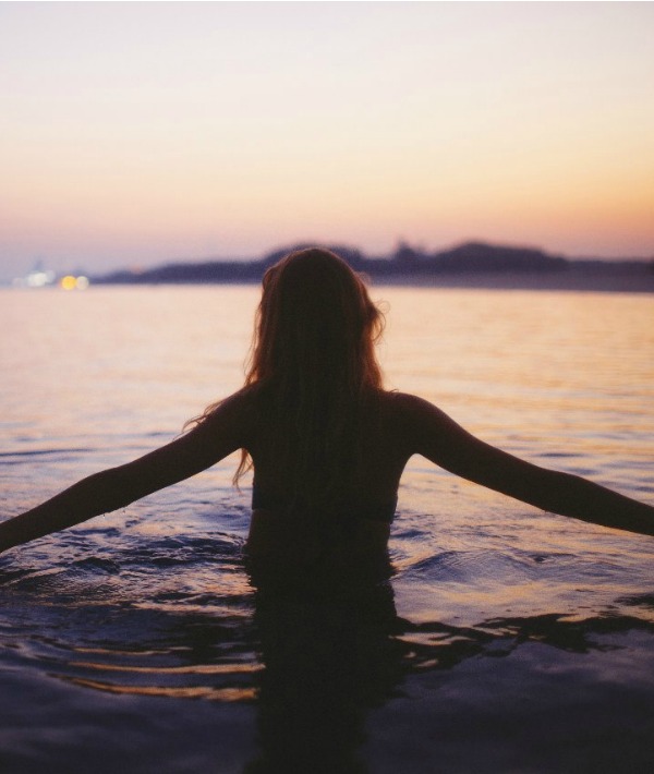 172769-woman-wading-in-water.jpg