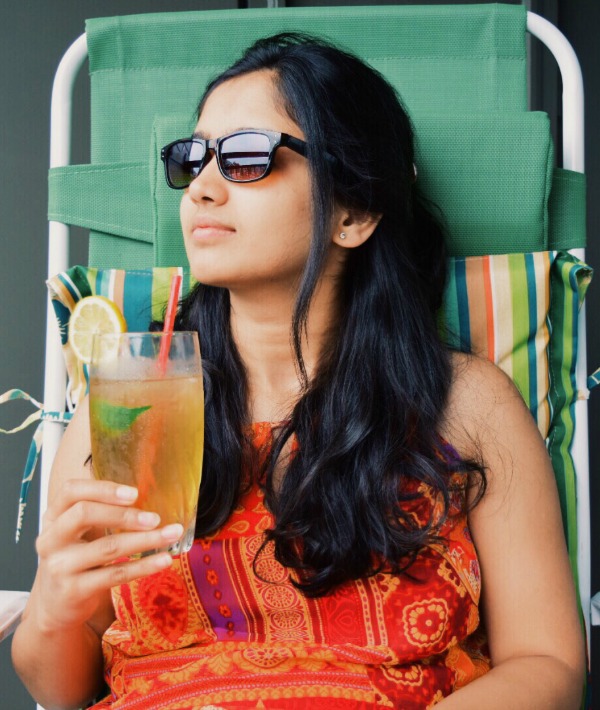 172778-woman-lawn-chair-drink.jpg