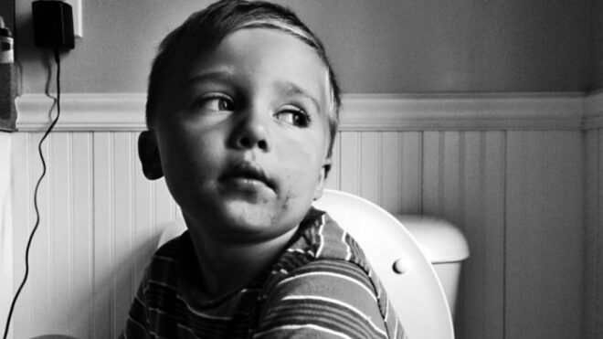boy-sitting-toilet