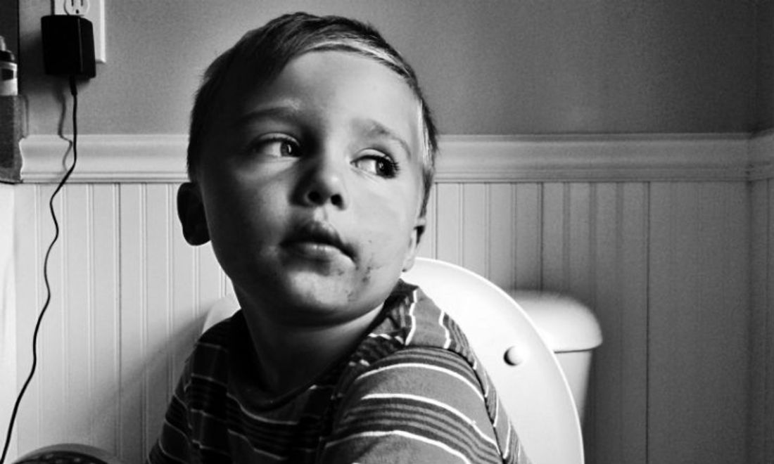 boy-sitting-toilet