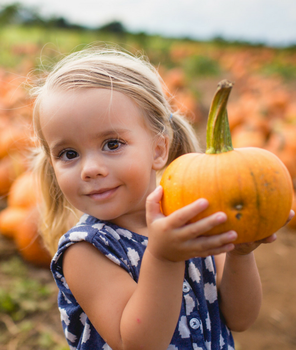 180948-girl-pumpkin-patch.png
