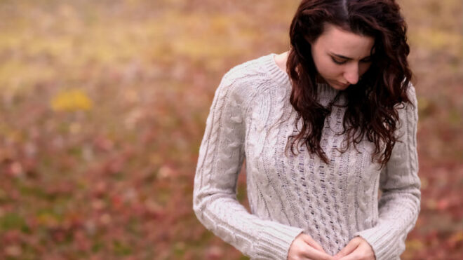woman-sad-field