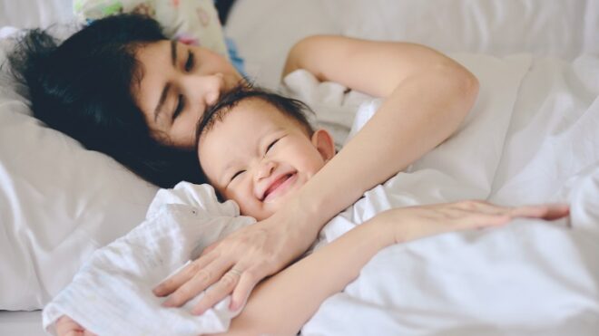 baby-cuddled-mom