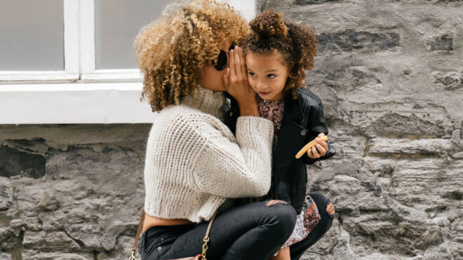mom-whispering-daughter