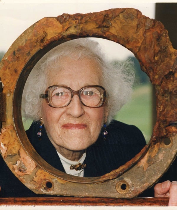 Millvina Dean The Youngest Survivor Of The Titanic Disaster. Pictured With A Porthole From The Titanic At An Exhibition At The National Maritime Museum In Greenwich