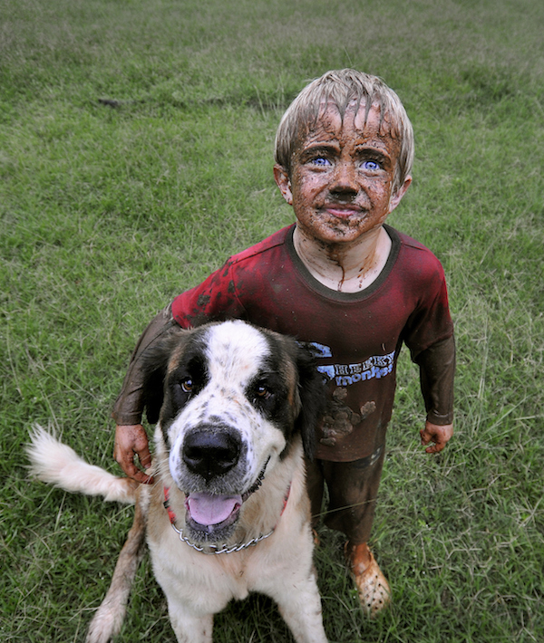 Muddy, Messy Child with Dog