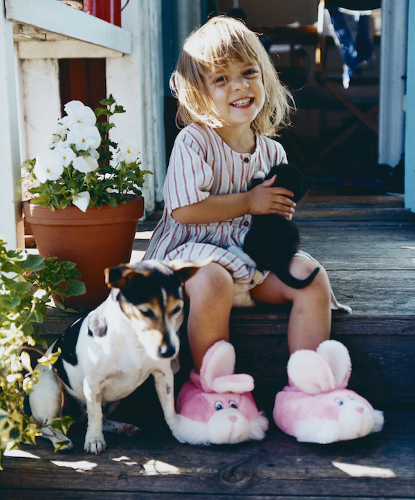 Girl in Slippers with Pets