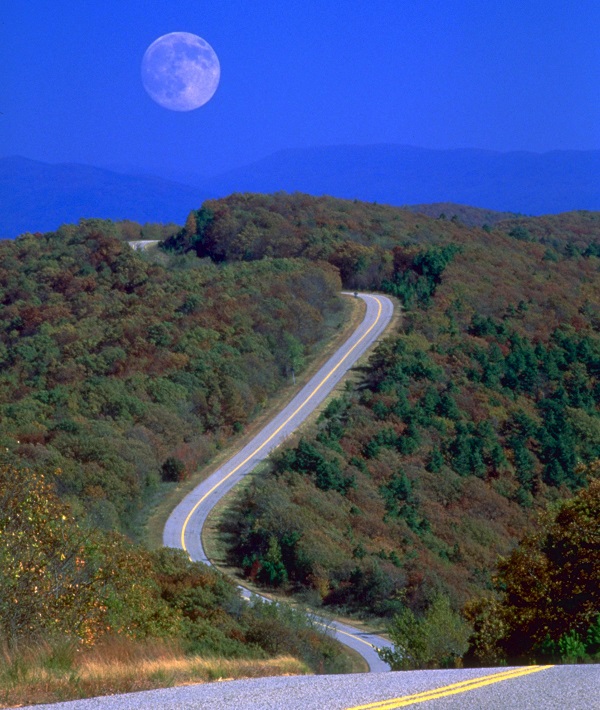 MOON IN DAYLIGHT SKY OVER THE TALIMENA SCENIC DRIVE THROUGH ARKANSAS AND OKLAHOMA, AMERICA